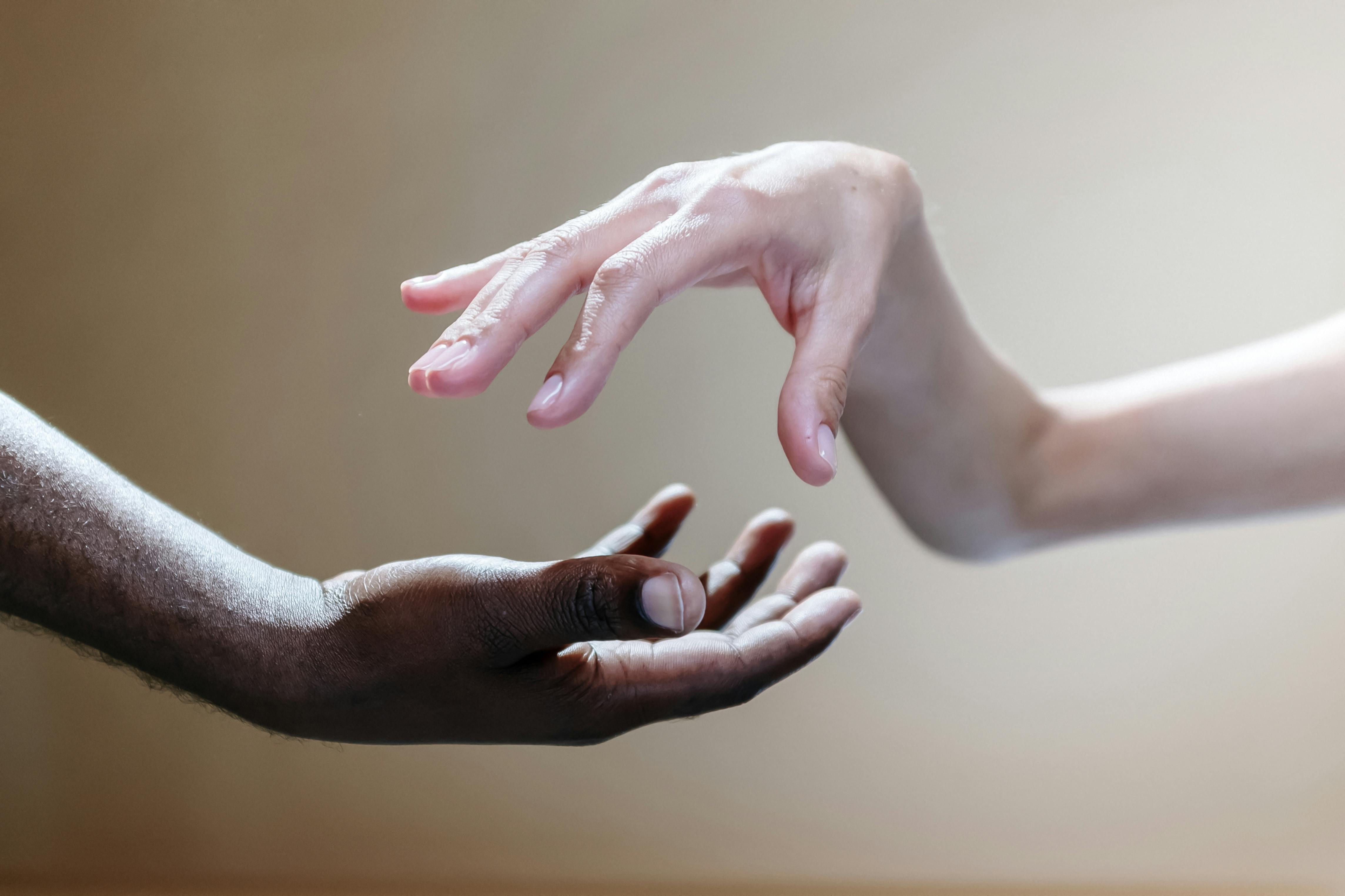 Hands with different skin tones